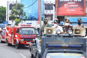 Wako – FKPD Lakukan Penyemprotan Disinfektan dan Bagi Masker