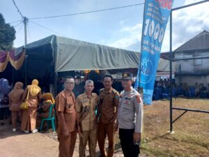 Kapolsek Mulak Ulu Polres Lahat Hadiri Launching Kampung Keluarga Berkualitas, di Desa Danau Belidang