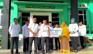 Aminah Ahli Waris Guru Ngaji Terima Santunan Jaminan Kematian BPJamsostek