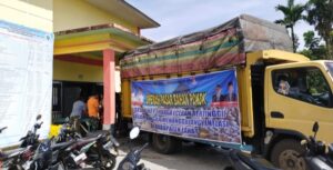 Kanit Binmas Polsek Kikim Tengah Aipda Heriyanto Pengamanan  Operasi Pasar Murah